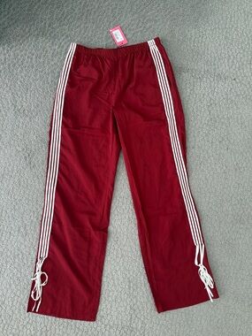 Edikted Track Pants with White Side Stripes and hem ties